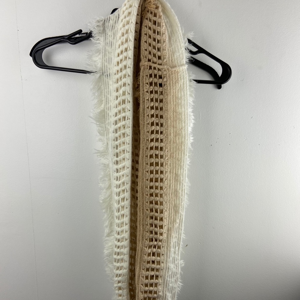 Crocheted ombré infinity scarf with fringe